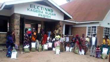 Flutopfer in der Gemeinde Kagera Sugar empfangen Nothilfe